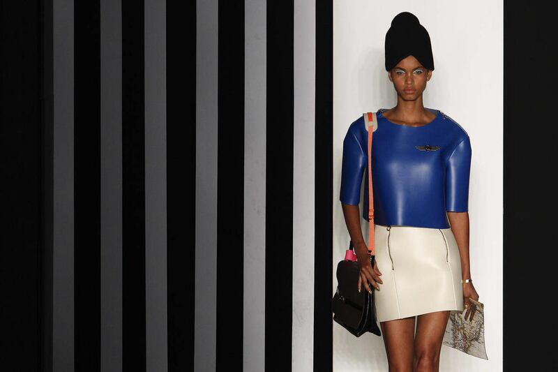 A model wears a creation from the New Order fall-winter fashion collection at Fashion Rio in Rio de Janeiro, Brazil, Thursday Jan. 12, 2012.