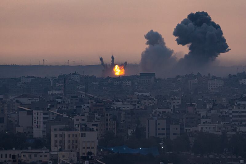 Smoke rises after the Israeli air strike in the Gaza Strip on Monday, Oct. 9, 2023.