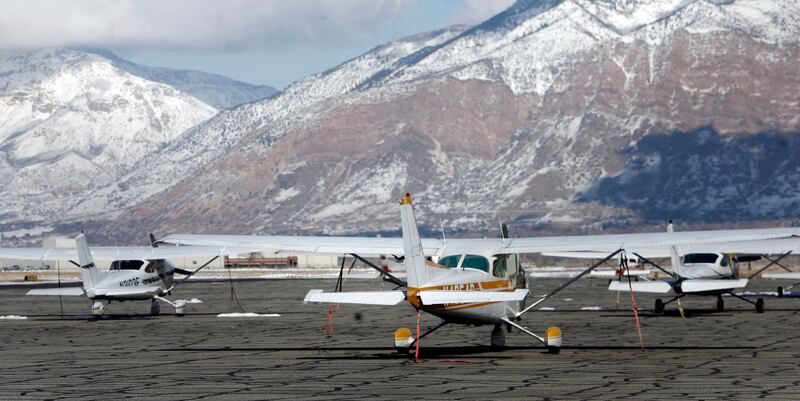 Small aircraft are parked at Ogden-Hinckley Airport on Friday, January 27, 2012.