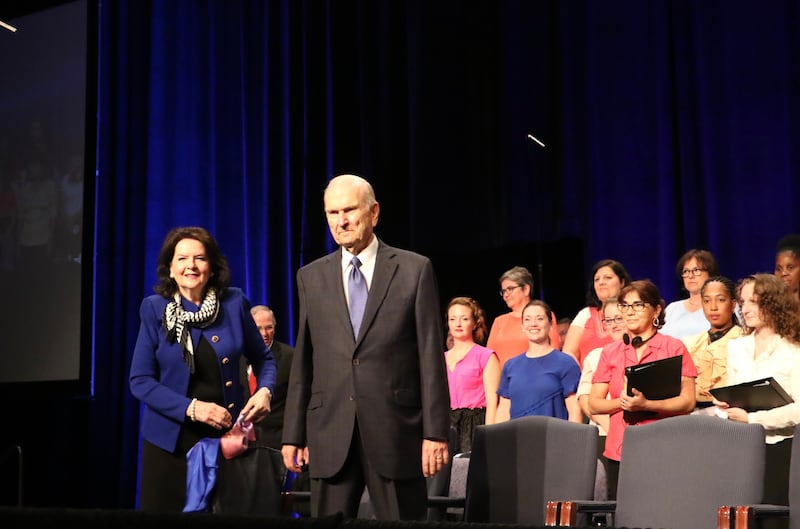 President Russell M. Nelson of The Church of Jesus Christ of Latter-day Saints and his wife, Sister Wendy Nelson, enter the Palais des congrès de Montréal auditorium prior to the start of the Aug. 18, 2018, devotional in Montreal.