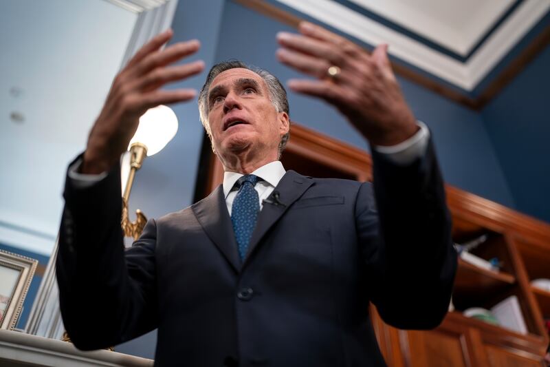 Utah Republican Sen. Mitt Romney speaks to reporters in his Capitol Hill office in Washington on Sept. 13, 2023.