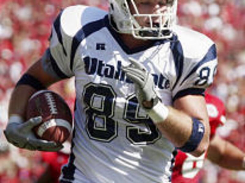 Utah State's Chris Cooley scores the Aggies' only touchdown of the day on a 41-yard reception in the first quarter Saturday against Nebraska in Lincoln, Neb. It was all downhill for the Aggies after this play.