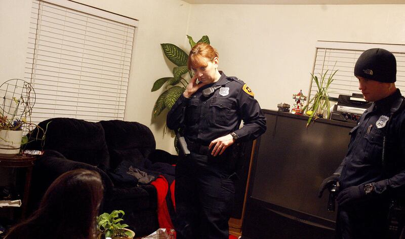FILE"” Salt Lake City Police Officers Jennifer Choate and Scott Hall respond to a call on Jan. 27, 2007. The Salt Lake County Council passed a resolution Tuesday declaring "freedom from domestic violence a fundamental human right." The resolution also cal