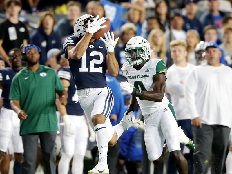 BYU wide receiver Puka Nacua hauls in a long pass during game against South Florida at LaVell Edwards Stadium in Provo. Nacua and the Cougars open the 2022 season against South Florida in Tampa.