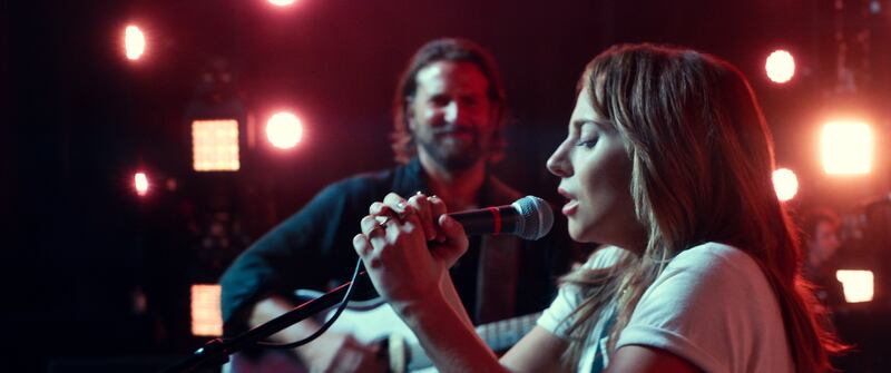Bradley Cooper is Jack and Lady Gaga is Ally in the drama "A Star Is Born."