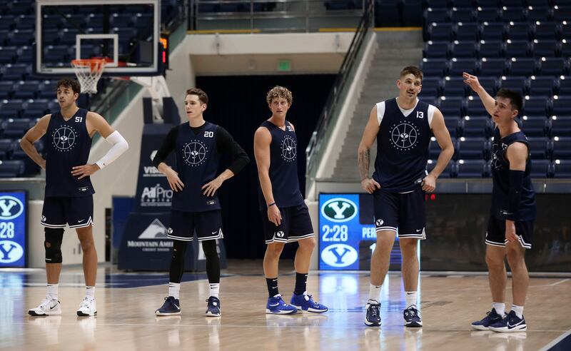 BYU’s Gavin Baxter, left, Spenser Johnson, Caleb Lohner, Richard Harward and Alex Barcello at practice at Marriott Center.