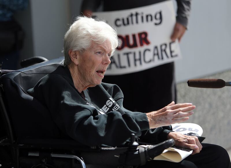 Barbara Toomer talks to members of the media outside the Wallace F. Bennett Federal Building in Salt Lake City on Tuesday, March 21, 2017, about the dangers of eliminating Medicaid and Affordable Care Act protections.