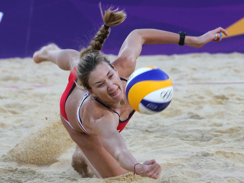 US Kerri Walsh dives for a ball during the quarterfinal women's beach volleyball match against Italy at the 2012 Summer Olympics, Sunday, Aug. 5, 2012, in London.