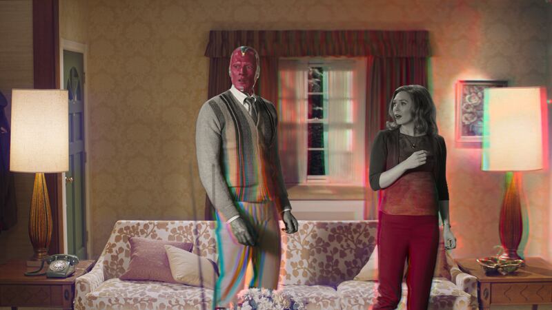 Paul Bettany is Vision and Elizabeth Olsen is Wanda Maximoff in Marvel Studios’ “WandaVision,” exclusively on Disney+. ‘WandaVision’ returns on Friday, Here’s how to watch.