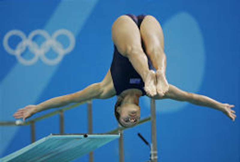 Rachelle Kunkel competes in the semifinals of the women's 3-meter springboard Thursday. Kunkel, who finished ninth, was the only American in the finals.