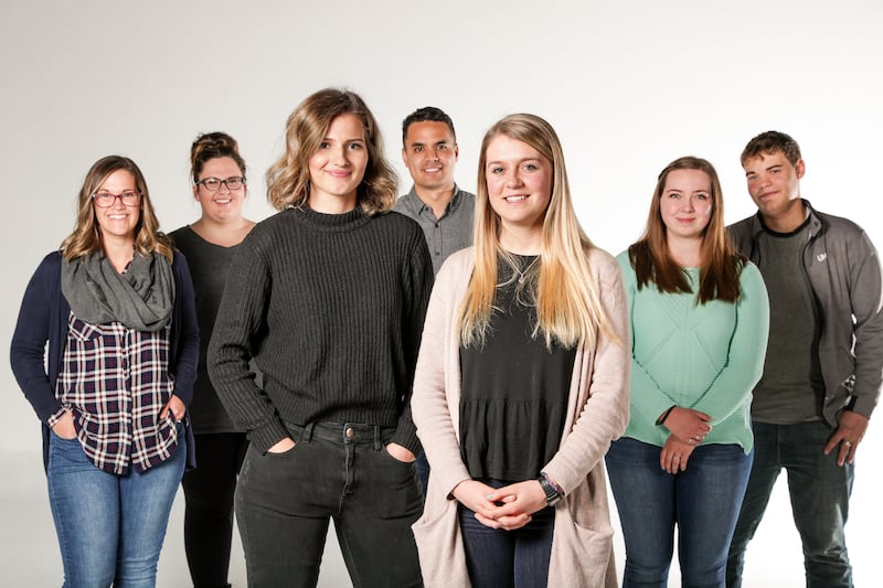 Rian Gordon, 24, Sarah Didier, 20, Marissa Folland, 20, Maurice Melligan, 28, Suzy Thornock, 20, Mallory Rogers, 23, and James Lambson, 20, left to right, pose for a photo at the Deseret News in Salt Lake City on Tuesday, Oct. 9, 2018.