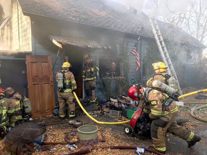 Fire fighters battle a house fire fire near 5700 South and 700 West in Murray, Monday morning, Nov. 19, 2018, that killed a grandmother and her granddaughter.