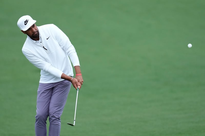 Tony Finau his on the second hole during a practice round in preparation for the Masters at Augusta National Golf Club Tuesday, April 9, 2024, in Augusta, Ga.