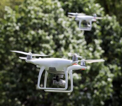 Drones fly in Memory Grove during a new pilot experience sponsored by DJI in Salt Lake City, Thursday, May 19, 2016.