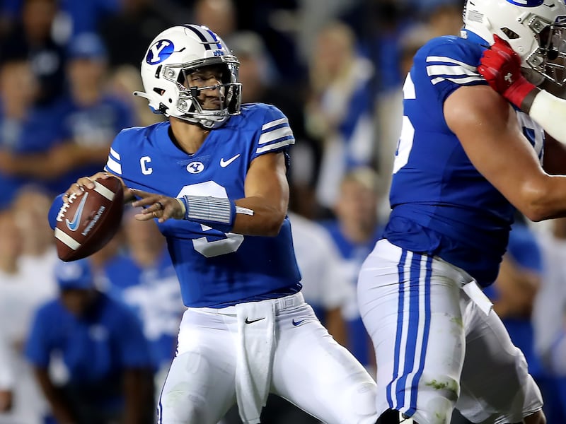 BYU Cougars quarterback Jaren Hall delivers a pass as BYU and Utah play.