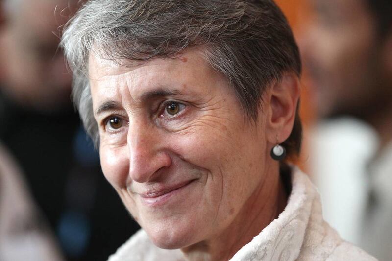 Secretary of the Interior Sally Jewell speaks reporters during a trade show for outdoor gear makers Wednesday, Jan. 22, 2014, in Salt Lake City. Jewell said Tuesday she would not resist legislation to reimburse Utah and other states that paid to reopen na