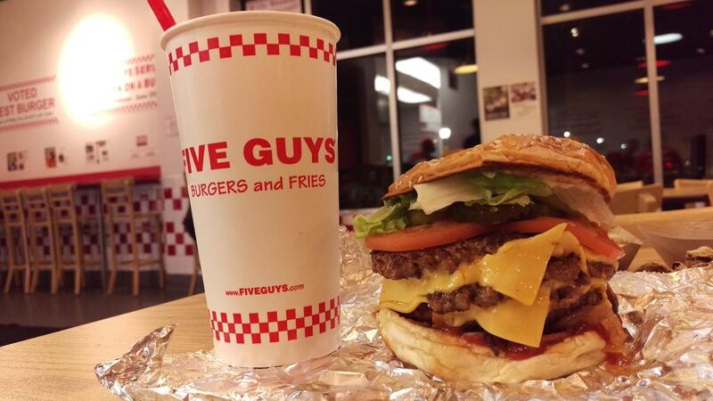 A photo of a triple bacon cheeseburger from Five Guys.