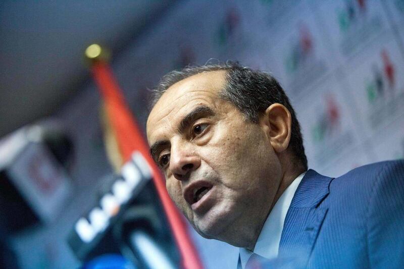 Mahmoud Jibril speaks to the media during a presser at National Forces Allies head quarter in Tripoli, Libya, Sunday, July 8, 2012. Libya's first nationwide elections in nearly five decades brought hints Sunday of an Arab Spring precedent: Western-leaning
