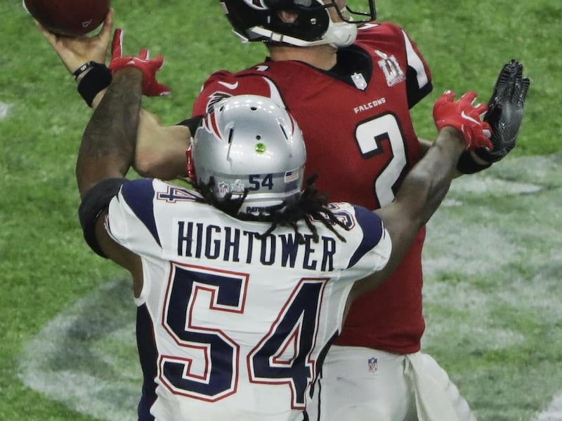 New England Patriots' Dont'a Hightower knocks the ball away from Atlanta Falcons' Matt Ryan during the second half of the NFL Super Bowl 51 football game Sunday, Feb. 5, 2017, in Houston. (AP Photo/Charlie Riedel)