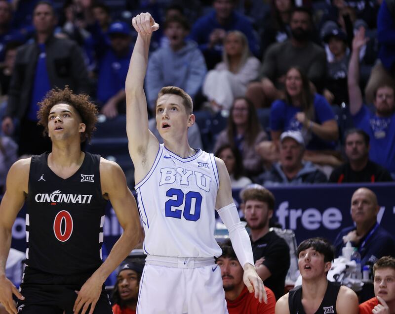 BYU guard Spencer Johnson hits a 3-pointer against Cincinnati on Jan. 6, 2024. The Cougars play their first Big 12 road game Tuesday game at Baylor.,