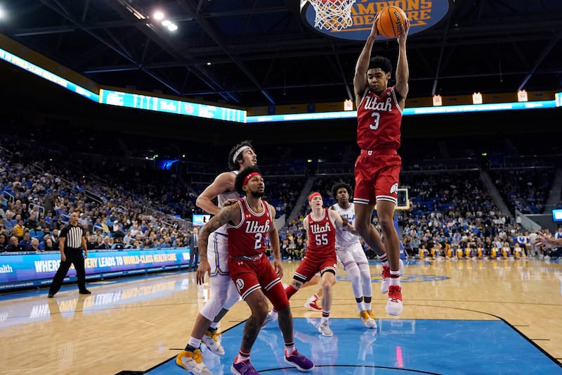 Utah forward Bostyn Holt grabs a rebound against UCLA during game Thursday, Jan. 12, 2023, in Los Angeles.