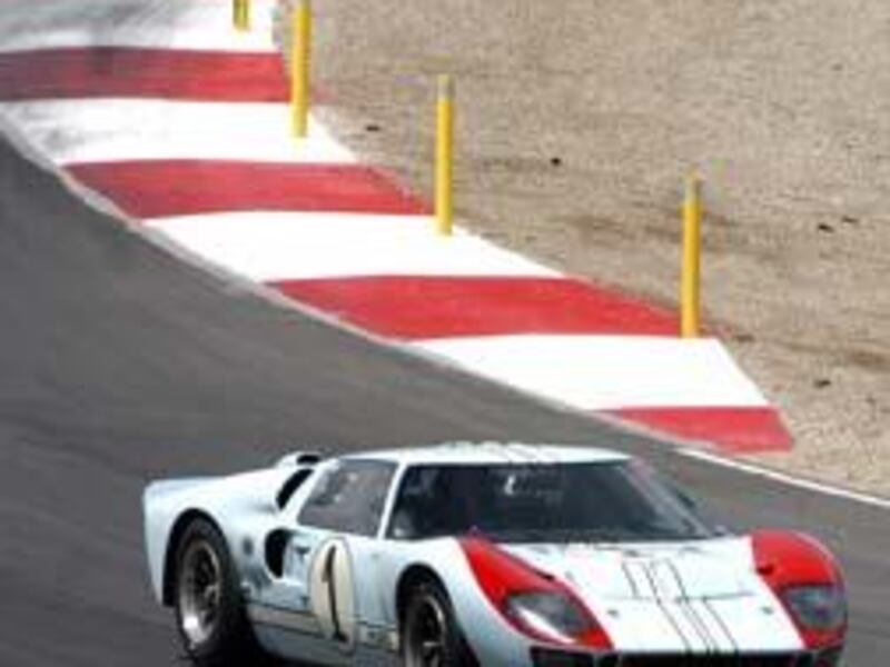 Driver Bill Murray in a 1966 Ford GT 40 races to a first-place finish Saturday at the Larry H. Miller Motorsports Park in Tooele.