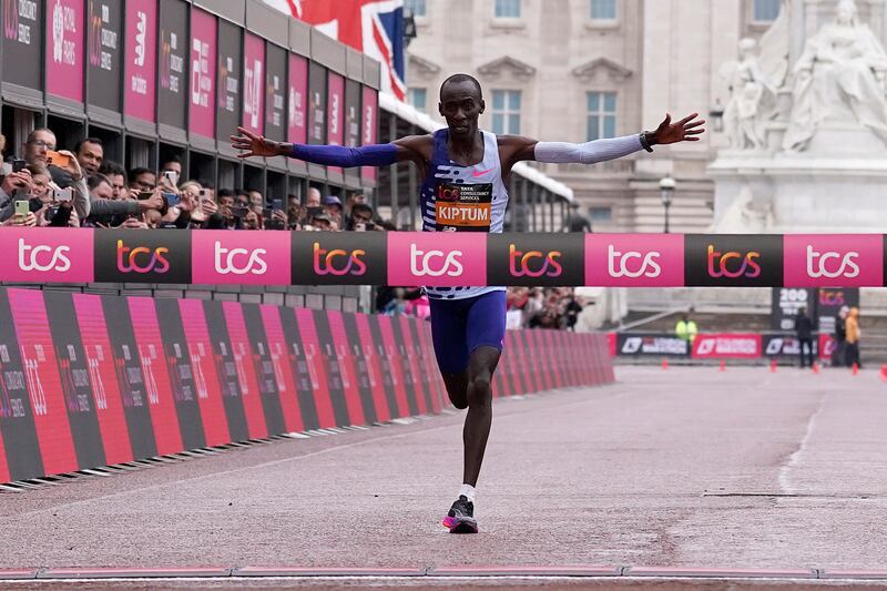 Kenya’s Kelvin Kiptum crosses the finish line to win the men’s race at the London Marathon in London, Sunday, April 23, 2023