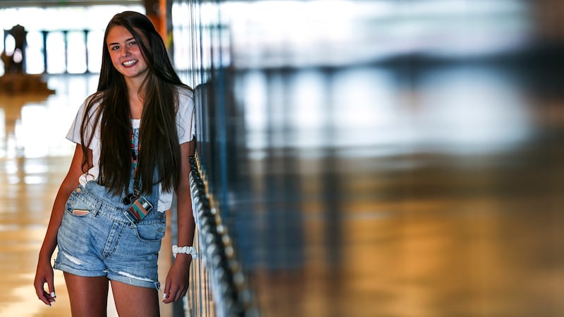 Katherine, who has struggled with overwhelming anxiety, at her high school on Friday, July 27, 2018.