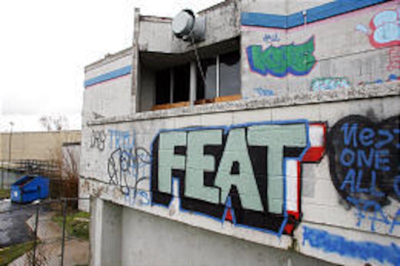 Graffiti covers a building near I-15 and 4500 South. Police say Utahns are likely to see more of it.