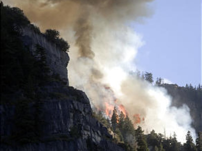 Wildfire above Bridal Veil Falls in Provo Canyon, Utah, on Sunday.