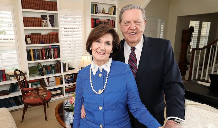 President Jeffrey R. Holland stands with his wife, Sister Patricia Holland.