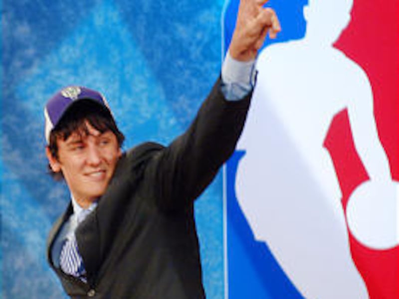 U. center Andrew Bogut reacts Tuesday after his No. 1 NBA Draft pick by the Milwaukee Bucks.