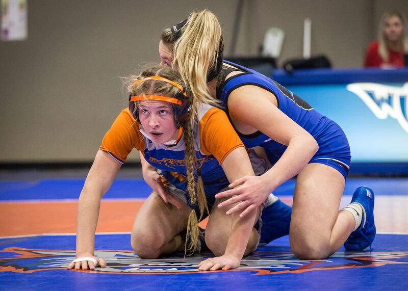 Water Canyon's Merci Jessop, left, and Carbon High's Taci Tapia compete during an exhibition match at Water Canyon High School in Hildale on Wednesday, Dec. 19, 2018.
