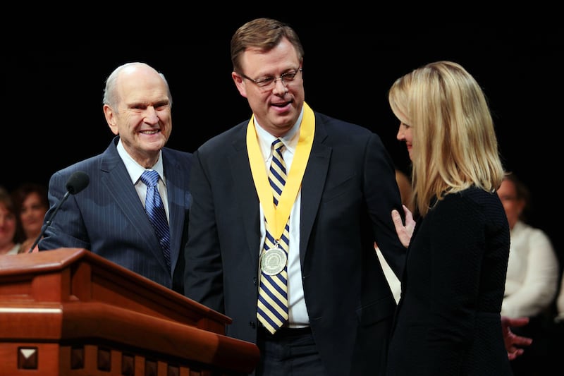 President Russell M. Nelson smiles after installing Clark Gilbert as president of BYU-Pathway Worldwide in 2017.