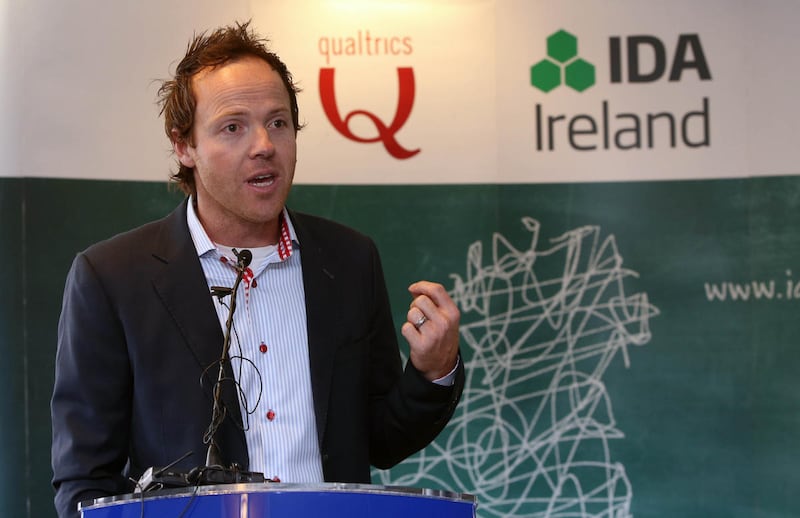 Qualtrics CEO Ryan Smith speaks during the company's official opening of their European headquarters on Friday, Sept. 27, 2013.