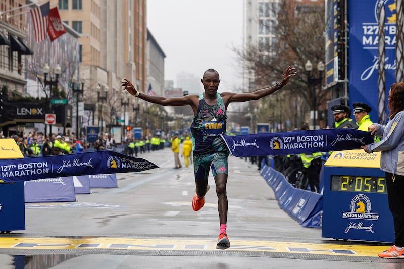 Evans Chebet of Kenya breaks the tape to win the 127th Boston Marathon, Monday, April 17, 2023, in Boston.