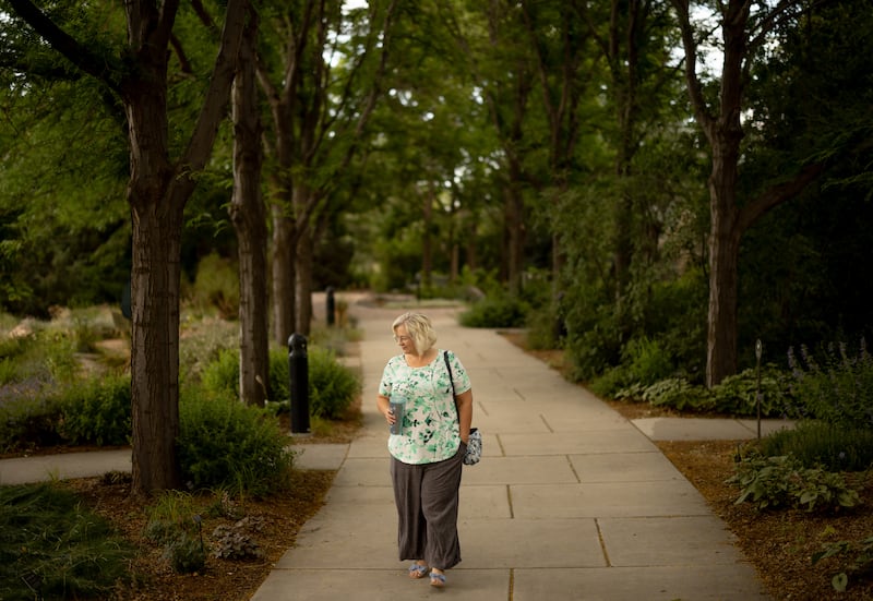 Shelisa Loertscher walks around the Conservation Garden Park in West Jordan on July 6, 2023.