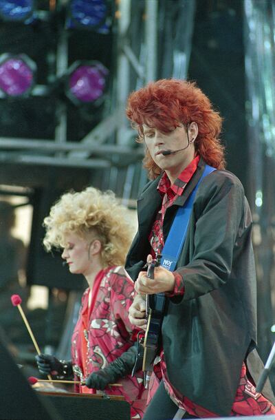 The Thompson Twins' Alannah Currie, left, and Tom Bailey perform during the Live Aid concert for famine relief at JFK Stadium in Philadelphia, Pa. July 13, 1985. Bailey will be in Utah at the Maverik Center on Friday, Sept. 21.