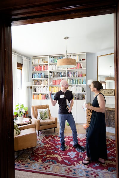 Candidate Derek Kitchen speaks with Rachel Fletcher while canvassing the 800 S. 600 East neighborhood of Salt Lake City on Friday, June 15, 2018.
