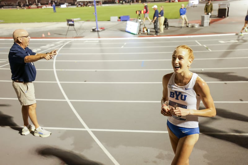 BYU's Jane Hedengren reacts after breaking the NCAA 10,000-meter record Thursday, May 28, 2026, at the NCAA West regionals in Fayetteville, Arkansas.