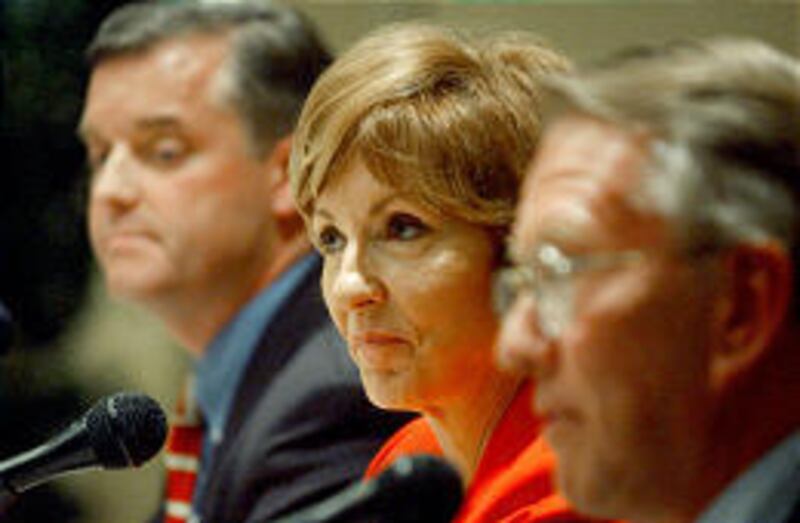 Democrat Peter Corroon, left, Republican Nancy Workman and Independent Merrill Cook debate on Monday.