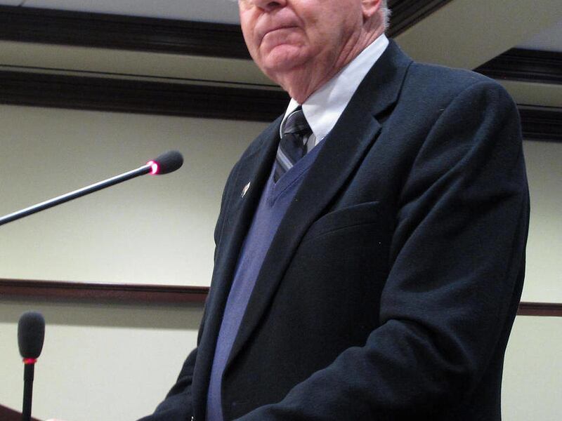 Rep. Dennis Lake, R-Blackfoot, speaks before the House State Affairs Committee on Tuesday, Jan. 31, 2012 at the Idaho Capitol in Boise. The 2012 Legislature may be the session where lawmakers trim some elected officials"™ retirement benefits, if pension r