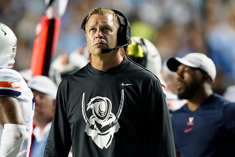 Virginia head coach Bronco Mendenhall looks on during game against North Carolina in Chapel Hill, N.C., Sept. 18, 2021.