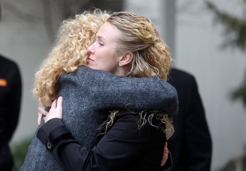 The Rev. Nancy Cormack-Hughes, St. Mark’s Hospital director of spiritual care, hugs Mariah Liechty during MountainStar Healthcare’s COVID-19 memorial ceremony outside of St. Mark’s Hospital in Millcreek on Wednesday. Liechty’s mother spent 70 days at St. Mark’s Hospital fighting COVID-19 and its aftereffects.