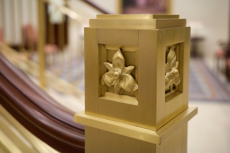The design of Guatemala's national flower, the monja blanca, is shown on staircase railing inside the Miraflores Guatemala City Guatemala Temple.