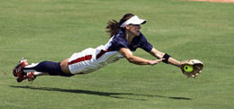 U.S. centerfielder Amanda Freed catches fly ball from a Taiwan batter. She then threw to first for a double play.