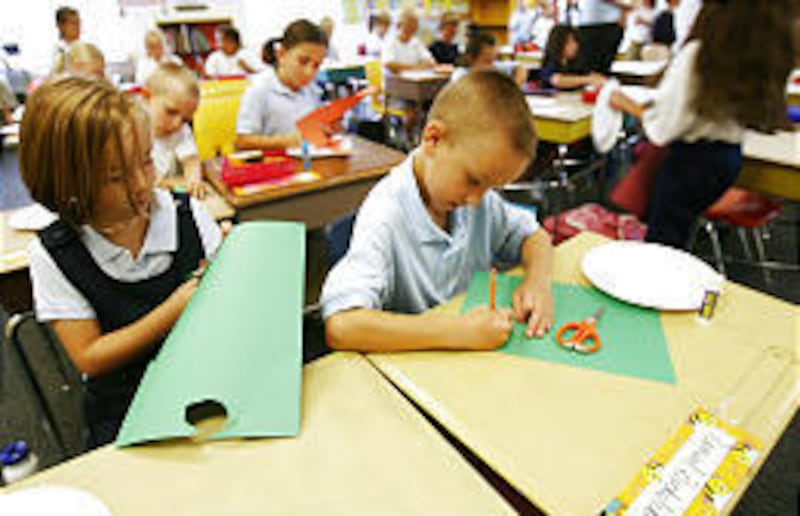 Makenna Bascom and Samuel Beckstrand join their third-grade classmates at Odyssey Charter School in American Fork.