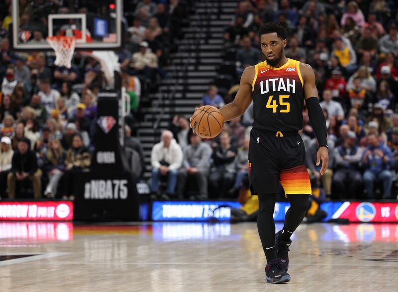 Utah Jazz guard Donovan Mitchell dribbles the ball.
