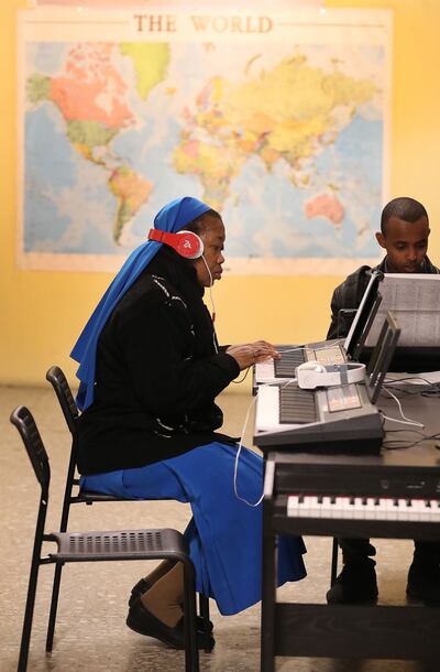 A Catholic Nun practices piano at St. Paul's Within the Walls Episcopal Church in Rome, Italy on Thursday, March 7, 2019. The Church of Jesus Christ of Latter Day Saints partners with the Catholic church to help refugees.