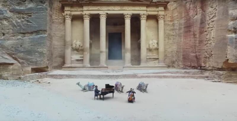 Jon Schmidt and Steven Sharp Nelson play the Indiana Jones theme in Petra, Jordan.